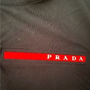 Prada Black and Red Logo Apparel